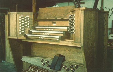 The organ console, at the workshop in 1975